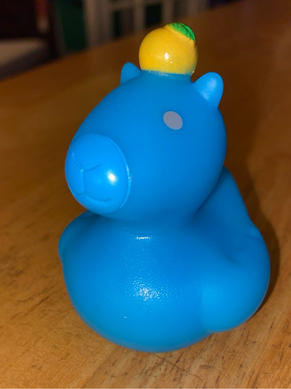 This is a blue 2-inch "Capybara Ducky" produced by Rhode Island Novelty.